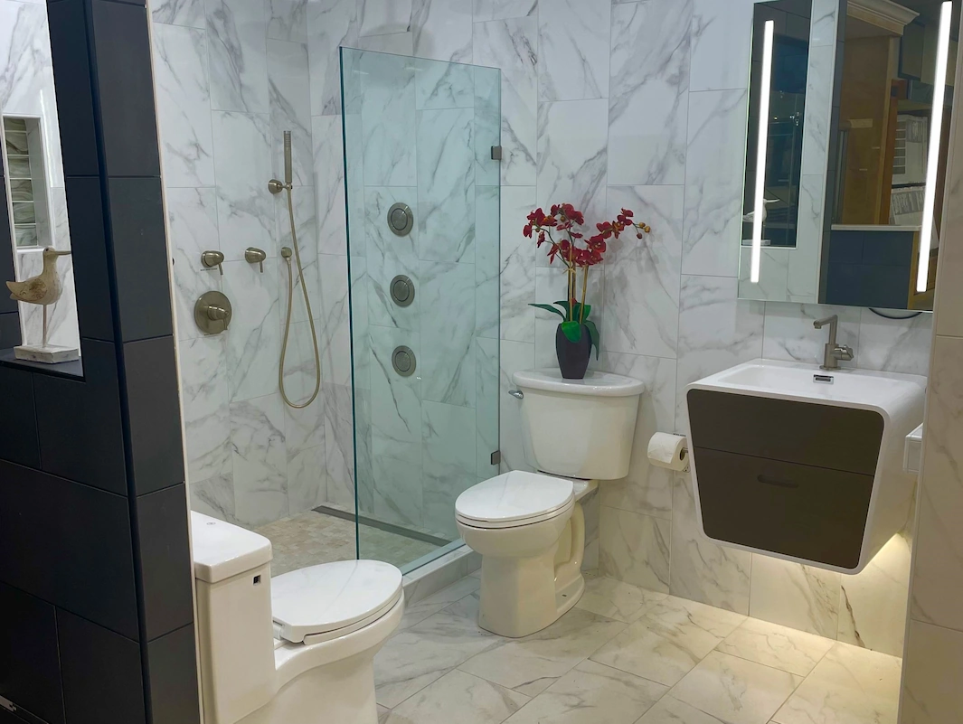 Inside of Aladdin Carpet and Floors Showroom in Rockville, MD Bathroom Display.